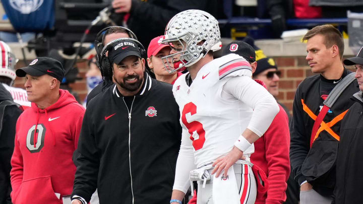 Nov 25, 2023; Ann Arbor, Michigan, USA; Ohio State Buckeyes head coach Ryan Day talks to quarterback Kyle McCord (6) on the sideline during the second half of the NCAA football game against the Michigan Wolverines at Michigan Stadium. Ohio State lost 30-24.