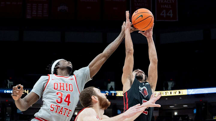 Jan 3, 2024; Columbus, OH, USA;
Ohio State Buckeyes center Felix Okpara (34) and Jamison Battle (10)