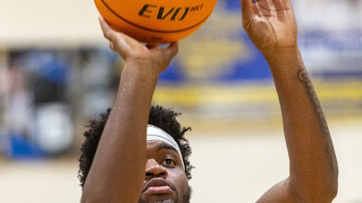 Newberry Logan Mccloud (10) shoots against Gainesville at Newberry High School in Newberry, FL on Tuesday, January 28, 2025. Newberry remains unbeaten winning 74-42 over Gainesville. [Alan Youngblood/Gainesville Sun]