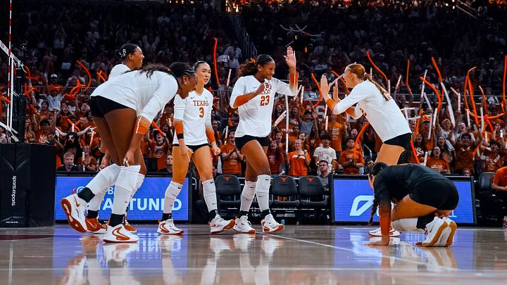 Texas celebrates after a point at Moody Center against Wisconsin in 2026.