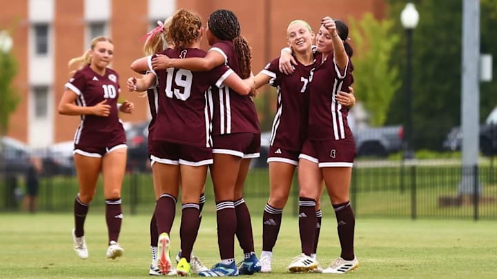 Mississippi State soccer players celebrate a goal scored in Saturday's exhibition match against Mercer.
