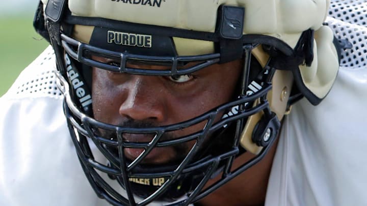 Purdue Boilermakers defensive lineman Mo Omonode (92) lines up for a drill Friday, Aug. 16, 2024, during Purdue football practice at Bimel Outdoor Practice Complex in West Lafayette, Ind.