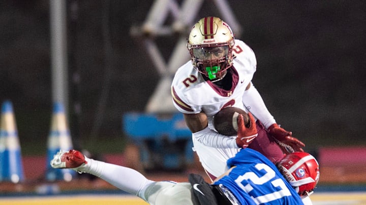 Hartfield's Bralan Womack (2) cuts to get past Prep's Russell Robbins (27) during the MAIS 6A championship at Mississippi College in Clinton, Miss., Saturday, Nov. 23, 2024. Hartfield won by a score of 19-14.
