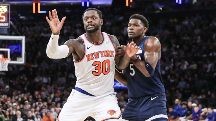 Jan 1, 2024; New York, New York, USA;  New York Knicks forward Julius Randle (30) is defended by Minnesota Timberwolves guard Anthony Edwards (5) while calling for the ball in the third quarter at Madison Square Garden. Mandatory Credit: Wendell Cruz-Imagn Images