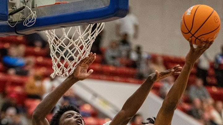 Victory Christian (1) Jozia Scott goes up for the shot over North Tampa Christian (14) Toni Bryant during the FHSAA 1A state semi final game at the RP Funding Center Tuesday February 25, 2025 in Lakeland Fl. Victory won 65-63 in 4 overtime periods.
Ernst Peters/The Ledger
