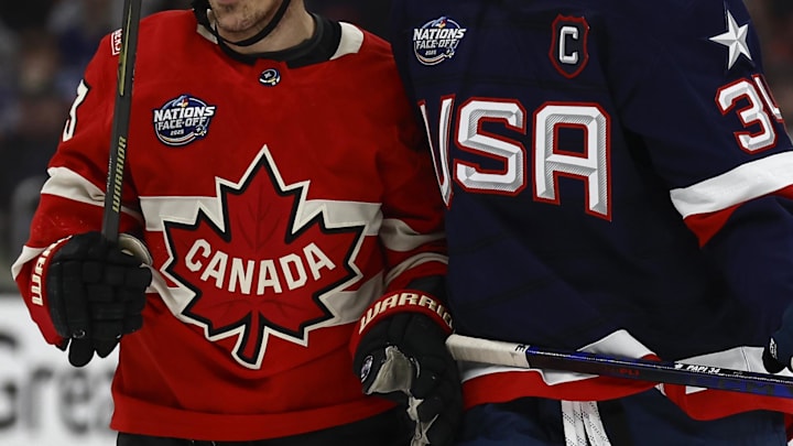 Feb 20, 2025; Boston, MA, USA; [Imagn Images direct customers only]  The Team Canada logo and the United States logo are seen during the 4 Nations Face-Off ice hockey championship game at TD Garden. Mandatory Credit: Winslow Townson-Imagn Images