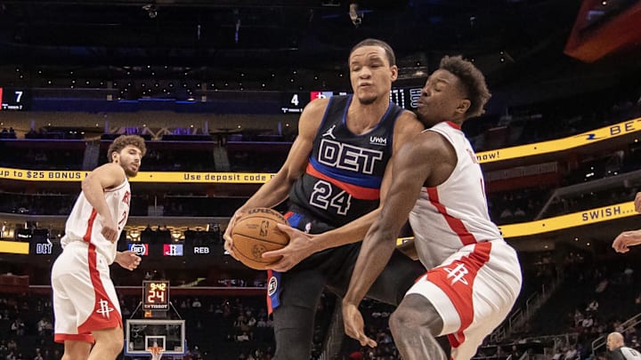 Jan 12, 2024; Detroit, Michigan, USA; Detroit Pistons forward Kevin Knox II (24) battles for the ball with Houston Rockets forward Jae'Sean Tate (8) during the in the first half at Little Caesars Arena. Mandatory Credit: David Reginek-Imagn Images Jan 12, 2024; Detroit, Michigan, USA; Detroit Pistons forward Kevin Knox II (24) battles for the ball with Houston Rockets forward Jae'Sean Tate (8) during the in the first half at Little Caesars Arena. Mandatory Credit: David Reginek-Imagn Images