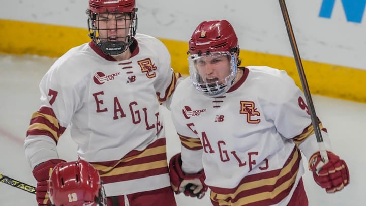 Boston College's Ryan Leonard, right, celebrates the go-ahead goal in the second period vs. Michigan