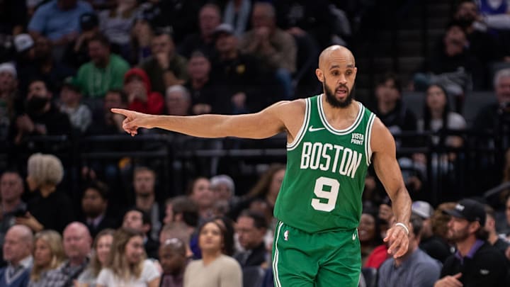 Dec 20, 2023; Sacramento, California, USA; Boston Celtics guard Derrick White (9) points to a team