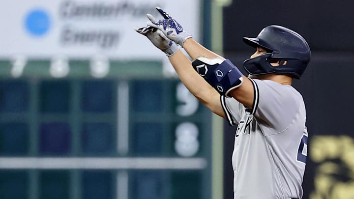 New York Yankees left fielder Giancarlo Stanton (27) reacts after a hit in their Game 1 loss to the Houston Astros 4-2 on Wednesday night.