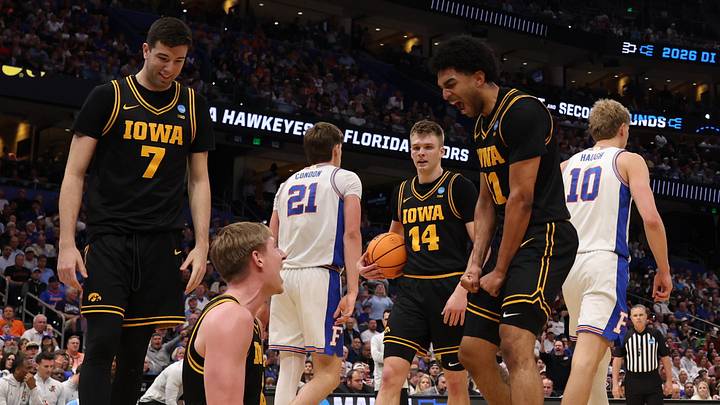 Mar 22, 2026; Tampa, FL, USA; Iowa Hawkeyes forward Cooper Koch (8) and Iowa Hawkeyes guard Kael Combs (11) celebrate after a play against the Florida Gators in the second half during a second round game of the men's 2026 NCAA Tournament at Benchmark International Arena. Mandatory Credit: Matt Pendleton-Imagn Images Mar 22, 2026; Tampa, FL, USA; Iowa Hawkeyes forward Cooper Koch (8) and Iowa Hawkeyes guard Kael Combs (11) celebrate after a play against the Florida Gators in the second half during a second round game of the men's 2026 NCAA Tournament at Benchmark International Arena. Mandatory Credit: Matt Pendleton-Imagn Images