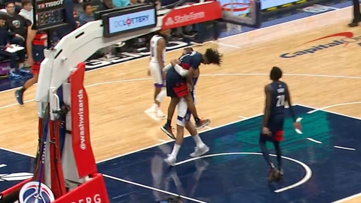 Jonas Valanciunas gives his former teammate Bub Carrington a ride.