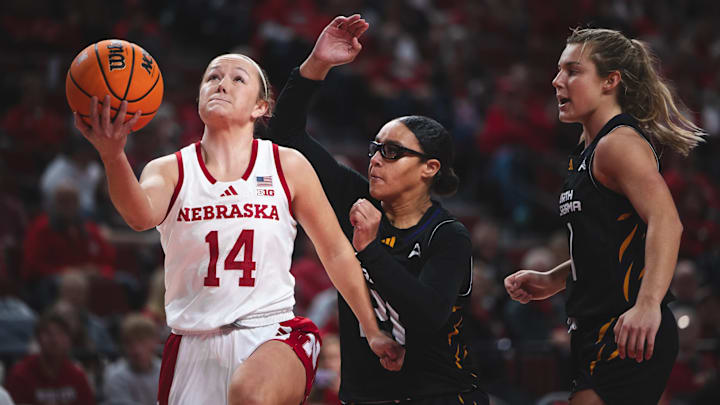 Nebraska women's basketball guard Callin Hake (14) was one of five double figure scorers in NU's win over Virginia.