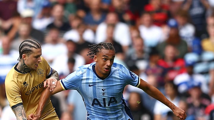 Ashley Phillips fends off Lyndon Dykes in the friendly win over QPR last month