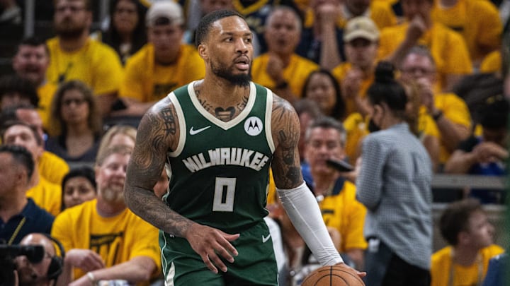 May 2, 2024; Indianapolis, Indiana, USA; Milwaukee Bucks guard Damian Lillard (0) dribbles the ball during game six of the first round for the 2024 NBA playoffs against the Indiana Pacers at Gainbridge Fieldhouse. Mandatory Credit: Trevor Ruszkowski-USA TODAY Sports