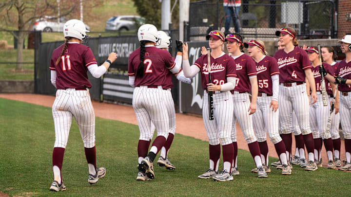 Kylie Aldridge and Cori McMillan get greeted with high fives from the rest of the squad. Kylie Aldridge and Cori McMillan get greeted with high fives from the rest of the squad.