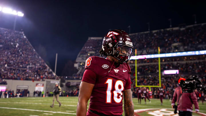 Pop Watson stands on the field prior to the 2024 regular season finale against Virginia. | Virginia Tech Athletics Pop Watson stands on the field prior to the 2024 regular season finale against Virginia. | Virginia Tech Athletics
