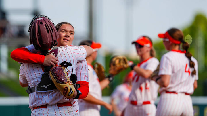 Avery Layton and catcher Zoe Yaeger hug after an outing in the circle. Avery Layton and catcher Zoe Yaeger hug after an outing in the circle.