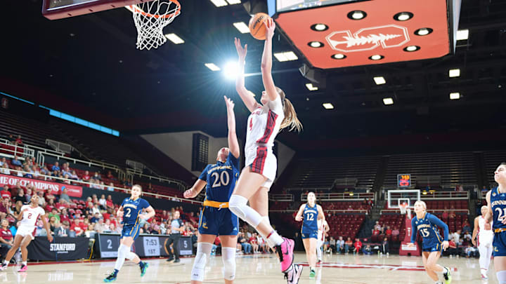 Alex Eschmeyer driving towards the basket against Quinnipiac in the WBIT 