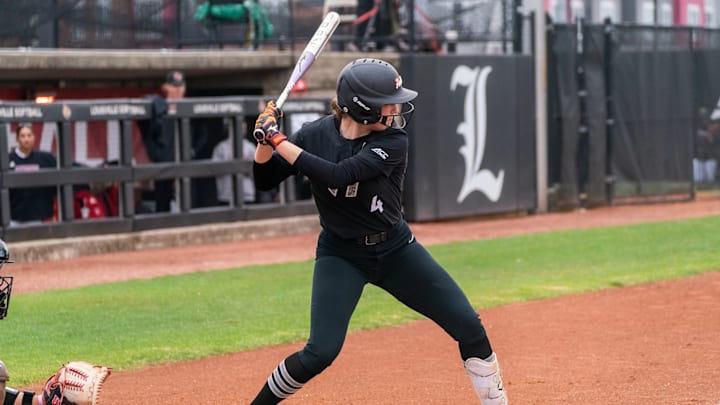 Michelle Chatfield looks to square up a ball against the Louisville Cardinals.