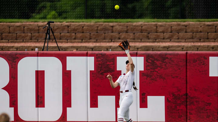 Bre Peck situates herself under a fly ball to centerfield.