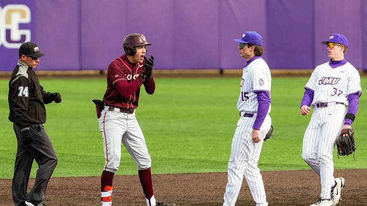 HARRISONBURG, Va. — Sam Grube celebrates a leadoff double against James Madison in March, 2026.