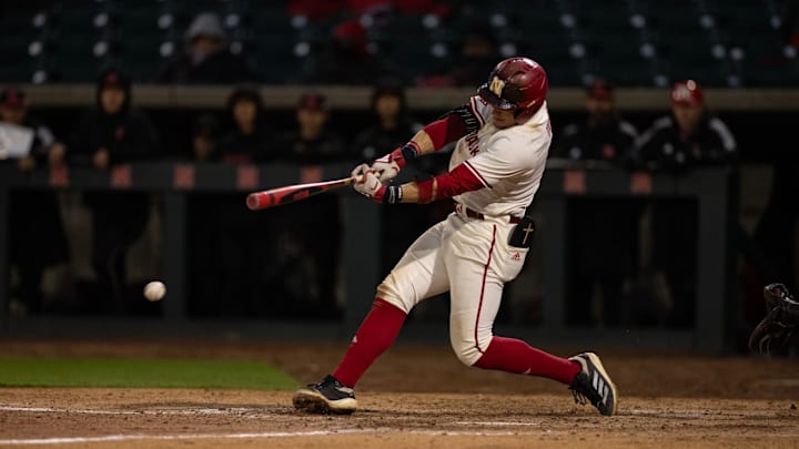 Nebraska third baseball Josh Overbeek hits the ball against Rutgers at Haymarket Park on April 4, 2025.