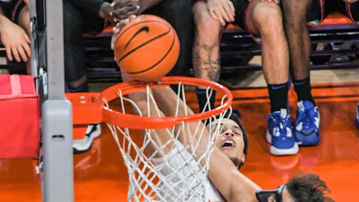 Sunday, November 19, 2023; Clemson senior guard Chase Hunter (1) dunks over Boise State forward