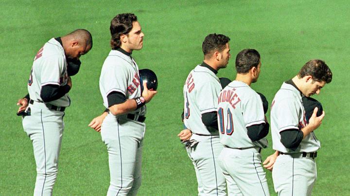 Oct 12, 1999; Atlanta, GA, USA; New York Mets player Darryl Hamilton (L-R) Mike Piazza, Edgardo Alfonso, Rey Ordonez and Robin Ventura during a moment of silence for basketball great Wilt Chamberlain prior to start of game 1 of NLCS at Turner Field. Mandatory Credit: Stuart Bayer/Gannett News Service-USA TODAY NETWORK 