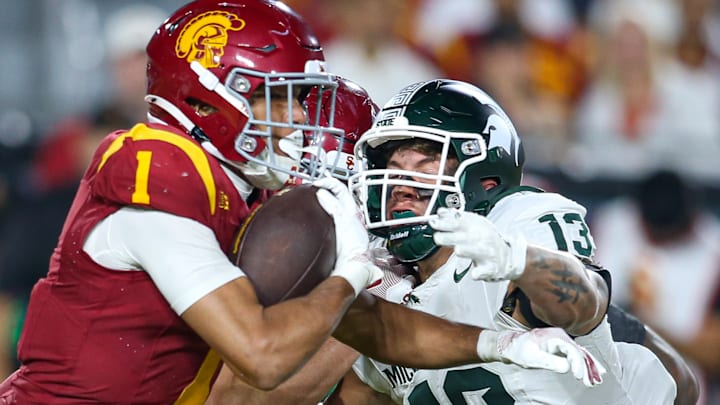 Michigan State EDGE Isaac Smith goes for a tackle during the Spartans' game against USC on Sept. 20, 2025. Michigan State EDGE Isaac Smith goes for a tackle during the Spartans' game against USC on Sept. 20, 2025.