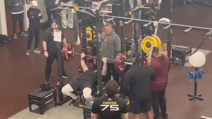 Quinn Carroll bench-pressing at Minnesota's Pro Day. 