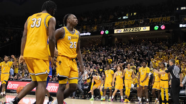 Dec 8, 2024; Columbia, Missouri, USA; Missouri Tigers forward Mark Mitchell (25) and center Josh Gray (33) celebrates with the bench after an important bucket late in the game at Mizzou Arena.