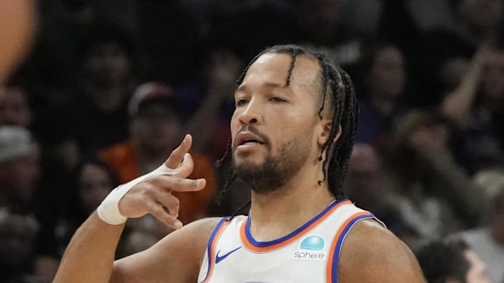 Dec 15, 2023; Phoenix, Arizona, USA; New York Knicks guard Jalen Brunson (11) rects after scoring