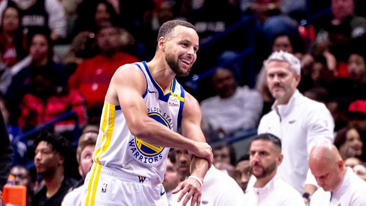Nov 22, 2024; New Orleans, Louisiana, USA;  Golden State Warriors guard Stephen Curry (30) reacts to having a foul called against him on the New Orleans Pelicans during second half at Smoothie King Center. Mandatory Credit: Stephen Lew-Imagn Images