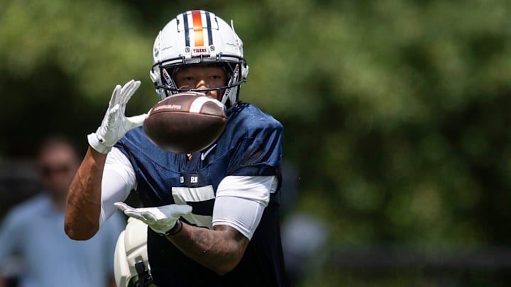 Auburn Tigers wide receiver Horatio Fields (5) catches a pass during practice at Woltosz Football Performance Center in Auburn, Ala. on Thursday, Aug. 14, 2025. Auburn Tigers wide receiver Horatio Fields (5) catches a pass during practice at Woltosz Football Performance Center in Auburn, Ala. on Thursday, Aug. 14, 2025.
