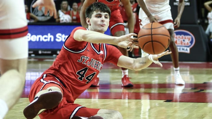 Oct 17, 2024; Piscataway, NJ, USA;  St. John's basketball forward Brady Dunlap (44) makes a pass from the floor in the first half against the Rutgers Scarlet Knights at Jersey Mike's Arena.