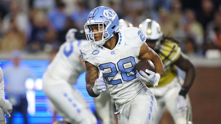 Oct 28, 2023; Atlanta, Georgia, USA; North Carolina Tar Heels running back Omarion Hampton (28) runs