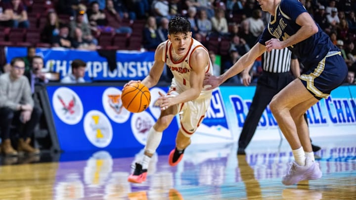 Idaho State guard Dylan Darling drives towards the rm during a game against Montana State. Idaho State guard Dylan Darling drives towards the rm during a game against Montana State.