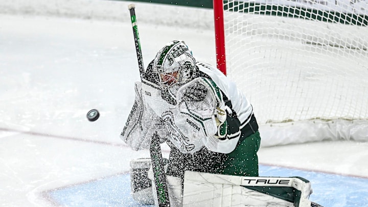 Michigan State's Trey Augustine saves a Notre Dame goal attempt during the second period earlier this season. Augustine has had a phenomenal freshman campaign which continued this past weekend against Penn State.