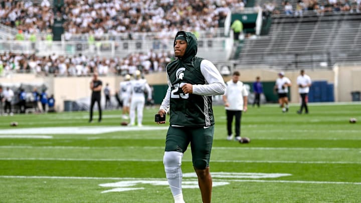 Michigan State linebacker Darius Snow warms up before the game against Washington on Saturday, Sept.
