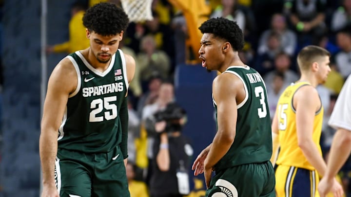 Michigan State's Jaden Akins, right, and Malik Hall celebrate during the second half in the game