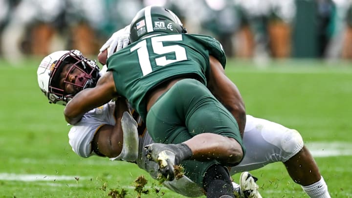 Michigan State's Angelo Grose, right, tackles Minnesota's Mohamed Ibrahim during the second quarter on Saturday, Sept. 24, 2022, at Spartan Stadium in East Lansing.

220924 Msu Minn Fb 096a