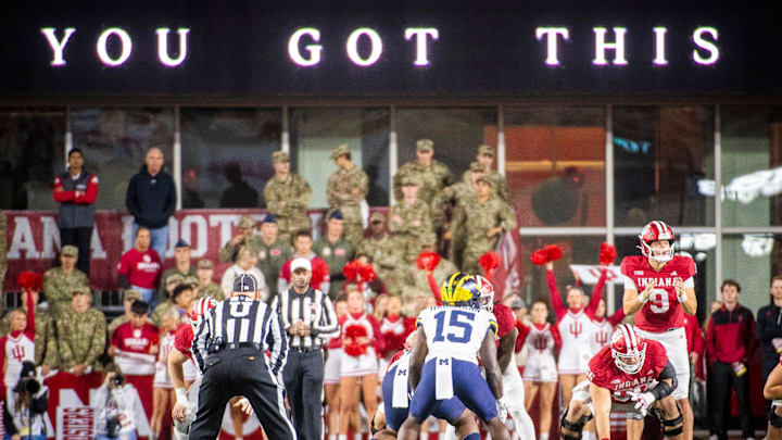 Indiana's Kurtis Rourke (9) prepares to take the snap during the Indiana versus Michigan football game at Memorial Stadium on Friday, Nov. 9, 2024.