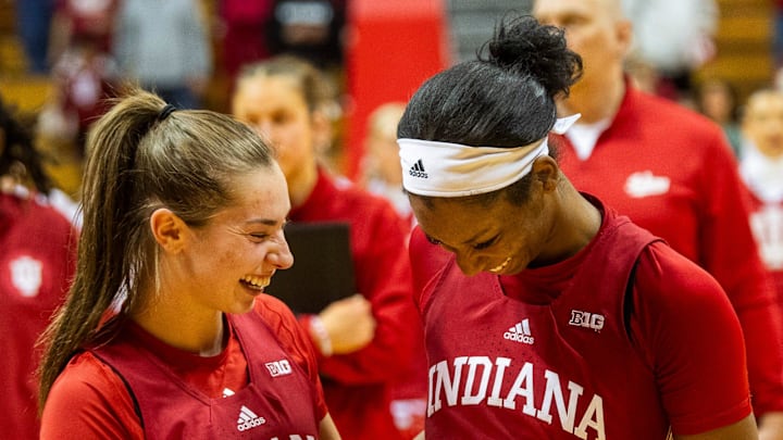 Indiana's Chloe Moore-McNeil (22) and Shay Ciezki (10) celebrate after the Indiana versus Maine women's basketball game at Simon Skjodt Assembly Hall on Sunday, Dec. 1, 2024.