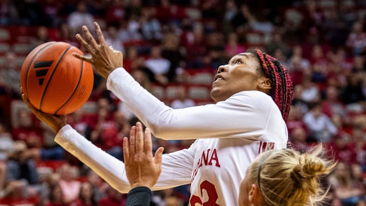 Indiana's Sharnecce Currie-Jelks (23) scores past Eastern Illinois' Julia Bengtson (20) during the second half of the Indiana versus Eastern Illinois women's basketball game at Simon Skjodt Assembly Hall on Thursday, Nov. 9, 2023.