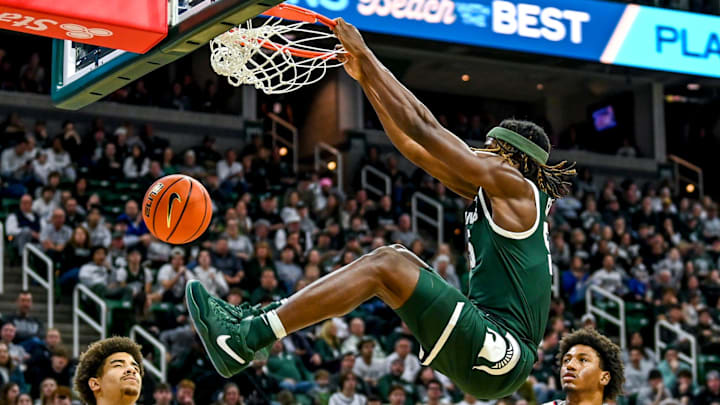 Michigan State's Coen Carr dunks against Southern Indiana during the second half on Thursday, Nov.