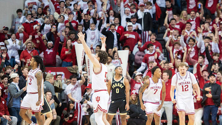 Indiana's Lamar Wilkerson (3), Conor Enright (5), Nick Dorn (7) and Tucker DeVries Indiana's Lamar Wilkerson (3), Conor Enright (5), Nick Dorn (7) and Tucker DeVries