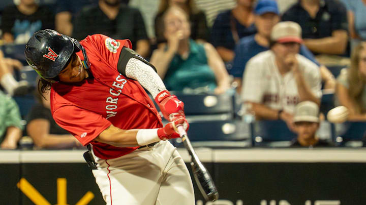 Worcester center fielder Jhostynxon Garcia hits a three-run double in the sixth inning against Lehigh Valley at Polar Park July 29.