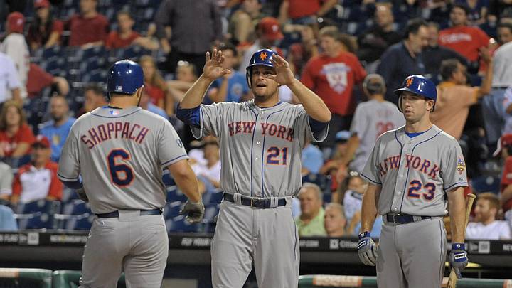 August 28, 2012; Philadelphia, PA USA; New York Mets catcher Kelly Shoppach (6) is greeted at home by teammates right fielder Lucas Duda (21) and left fielder Mike Baxter (23) after he hit a two run home run in the tenth inning against the Philadelphia Phillies at Citizens Bank Park. The Mets defeated the Phillies, 9-5 in 10 innings. Mandatory Credit: Eric Hartline-Imagn Images