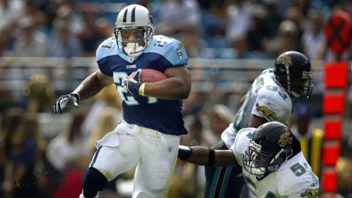 Running back Eddie George (27), in action against Jacksonville Jaguars in Jacksonville, Fla., on Oct. 26, was the Tennessee Titans' leading rusher for 2003 with 1,031 yards on 312 carries with 5 rushing touchdowns.